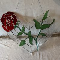Rose dans un cœur